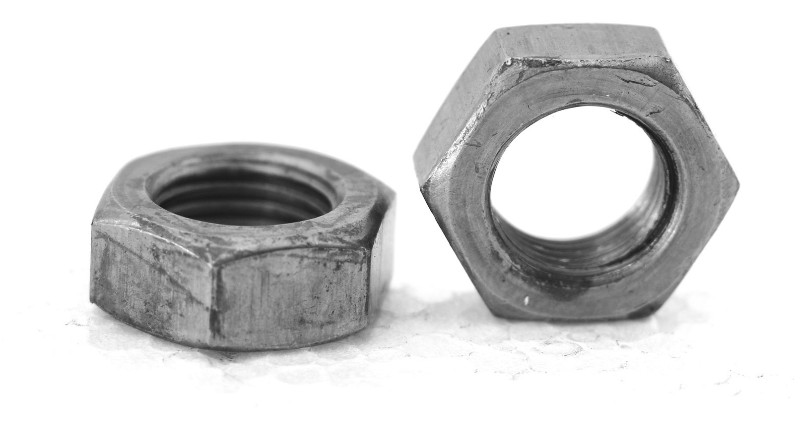 Tuerca hexagonal de rosca izquierda NC o NF